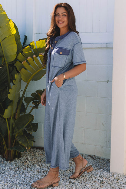 Beau Blue – Jumpsuit mit halber Knopfleiste und Brusttaschen, kurzärmlig und weitem Bein