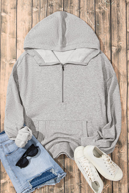 Hellgrauer Oversize-Hoodie mit Kängurutasche und halbem Reißverschluss