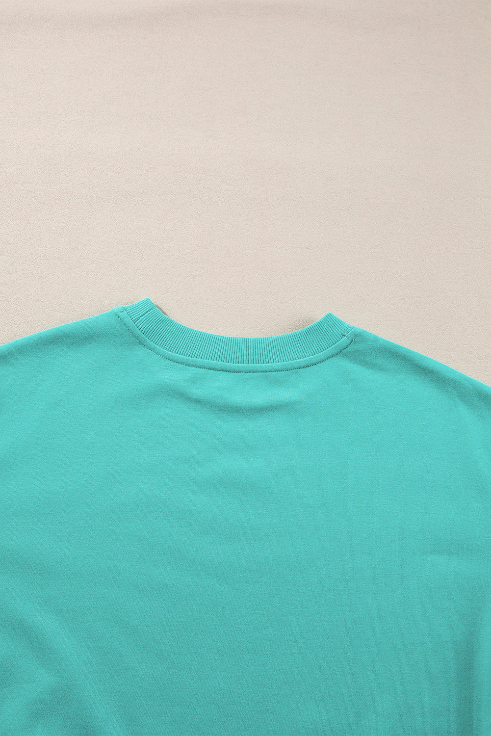 Aruba Blaues, schlichtes Sweatshirt mit Rundhalsausschnitt und überschnittener Schulter