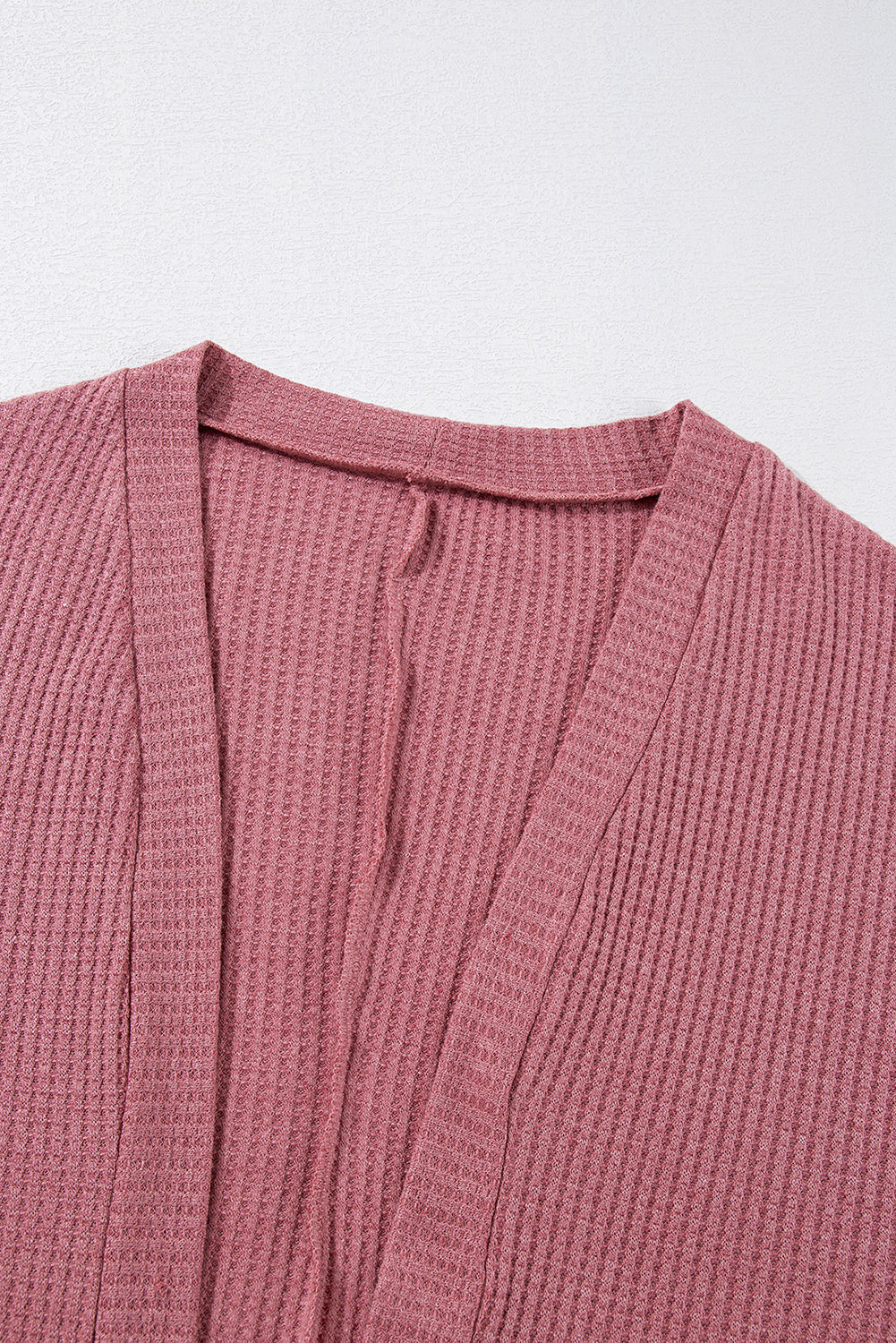 Mineralrote, einfarbige Strickjacke mit Waffelstrick und Tasche