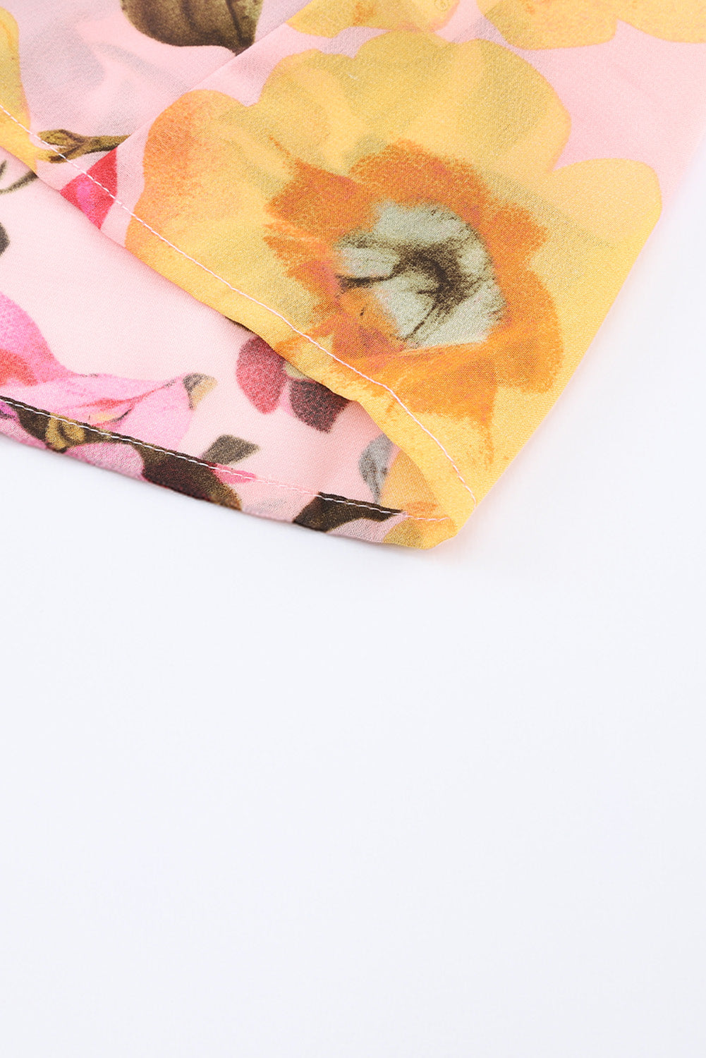 Rosa Bluse mit Blumenmuster und Rüschen