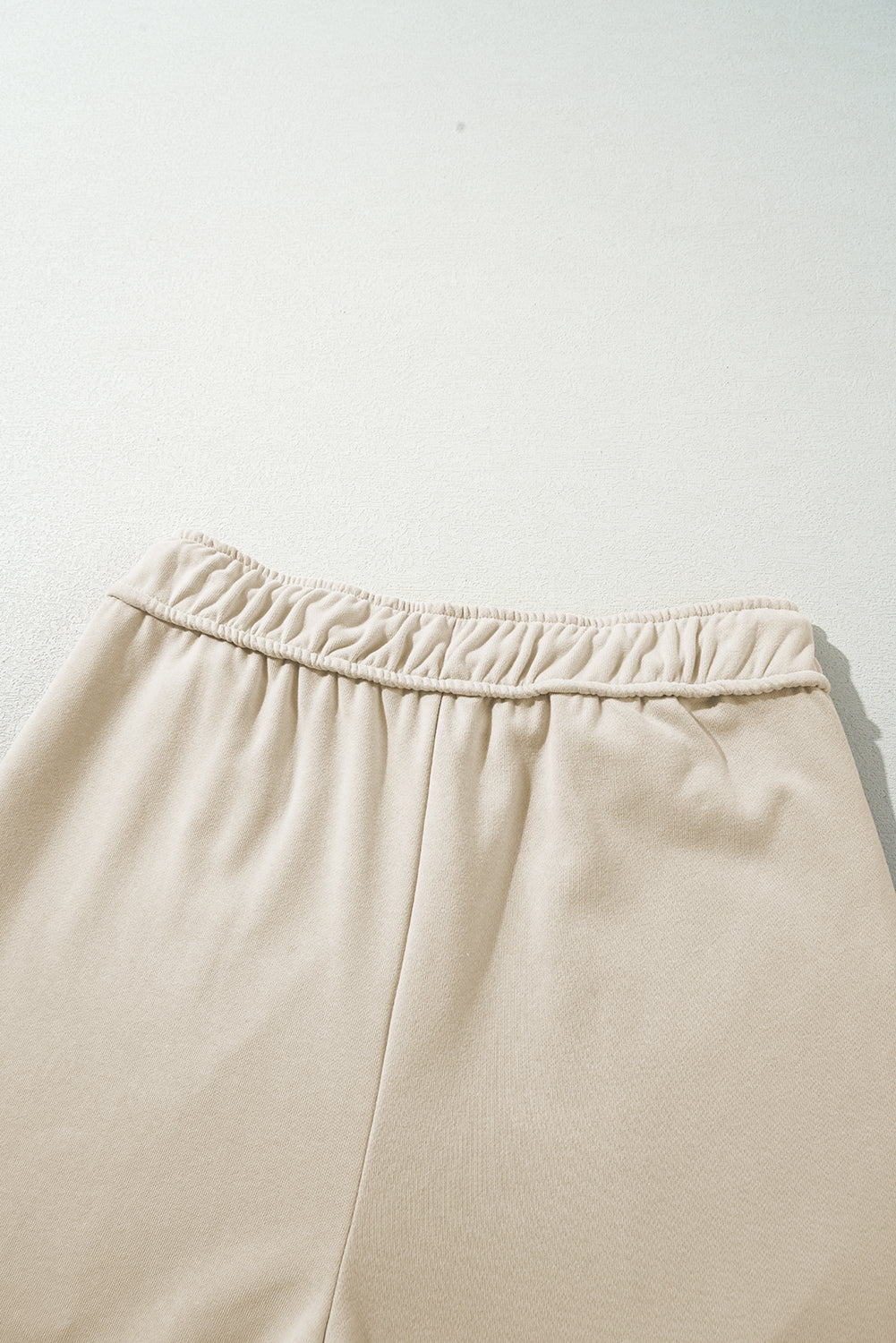 Aprikosenfarbene, lässige Hose mit weitem Bein und Kordelzug
