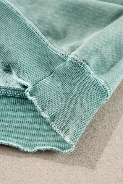 Mineralblaues, einfarbiges Sweatshirt mit Waffelstrick und Patchwork-Raglanärmeln