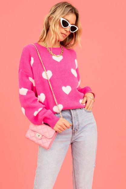 Hellrosa Pullover mit flauschigen Valentinstagsherzen und überschnittener Schulter