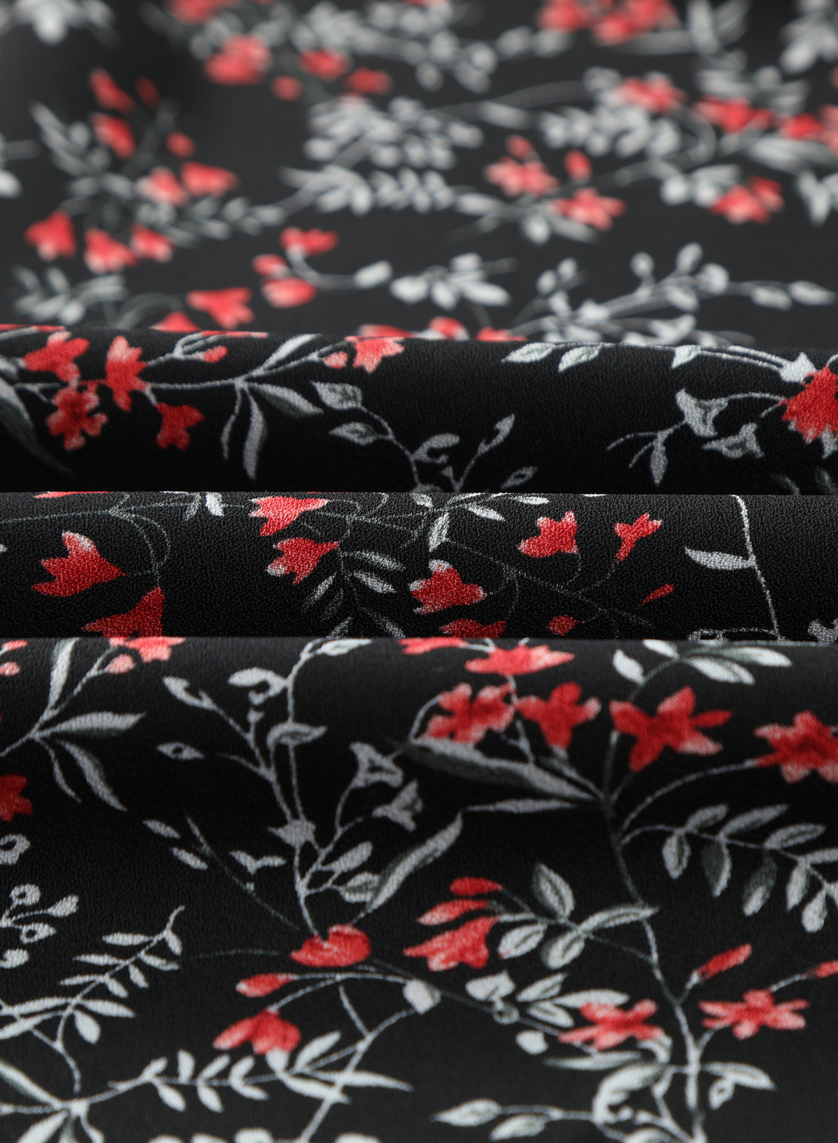 Schwarzes, mehrfarbiges Set mit gerüschtem Crop-Top und Maxirock mit Blumenmuster