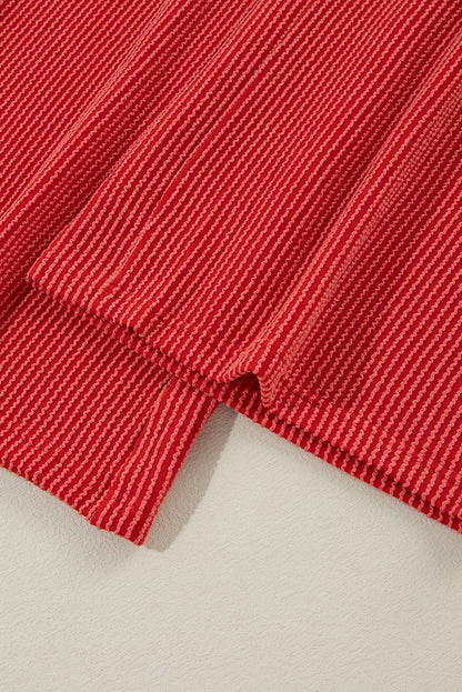 Feuerrotes JOLLY Set aus langärmligem Oberteil mit Kordelzug und Hosen mit Taschen