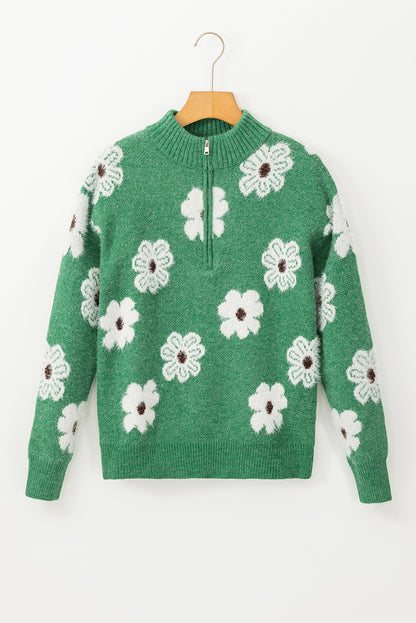 Grüner Pullover mit Blumenmuster und halblangem Reißverschluss sowie überschnittenen Schultern
