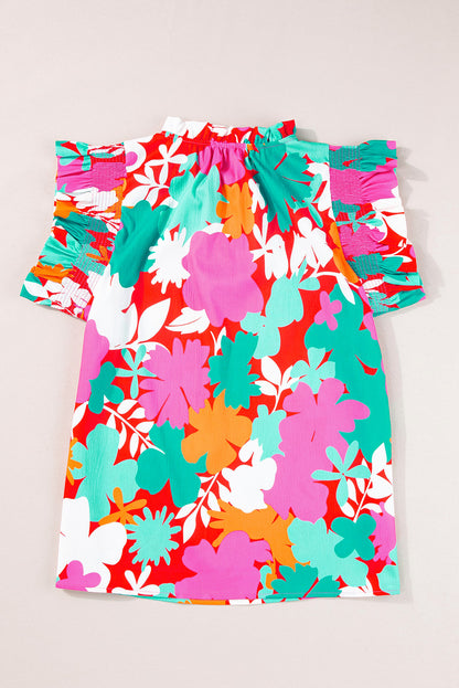 Grüne Bluse mit Blumenmuster, Krawatte, Schlitz am Hals und Rüschenbesatz