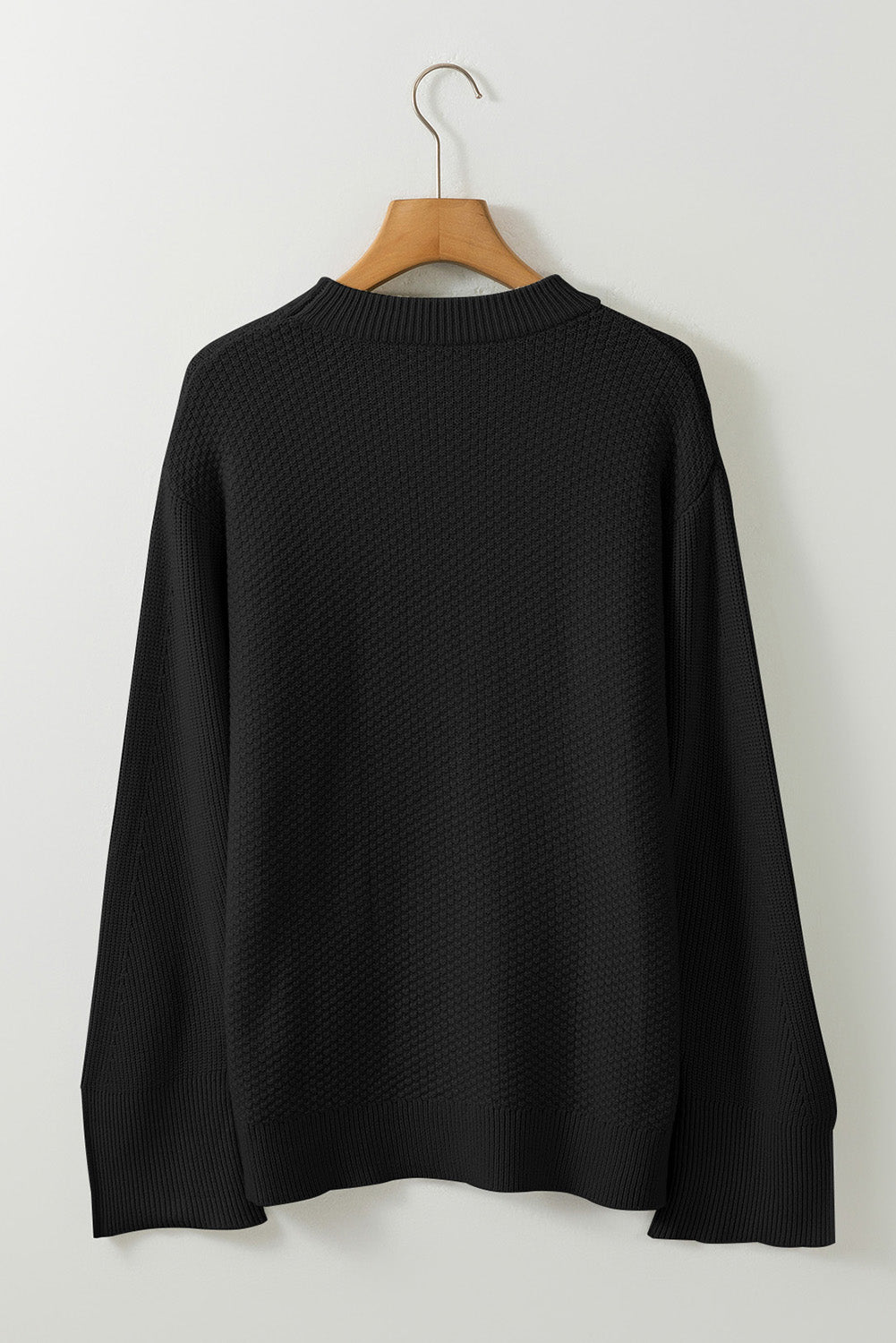 Schwarzer, unifarbener, strukturierter Strickpullover mit geteilten Bündchen und überschnittener Schulter