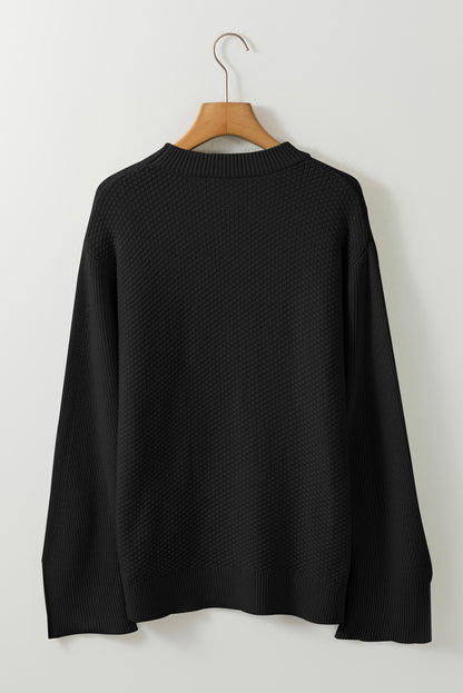 Schwarzer, unifarbener, strukturierter Strickpullover mit geteilten Bündchen und überschnittener Schulter