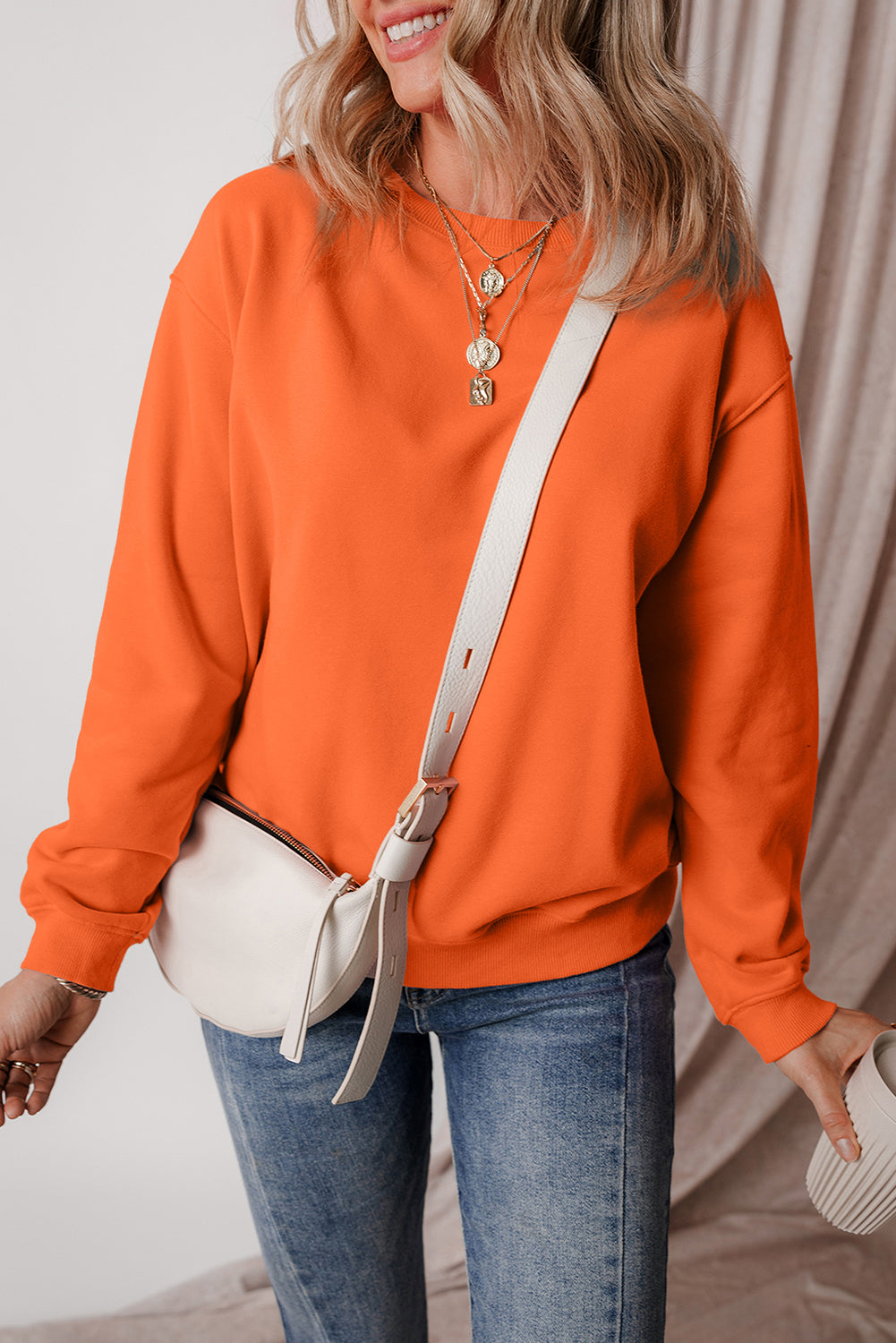 Einfarbiges Frottee-Sweatshirt mit überschnittener Schulter und Fleecefutter in Rotorange