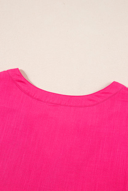 Erdbeerrosa Bluse mit V-Ausschnitt und geometrischer Stickerei, Quaste und Schleife
