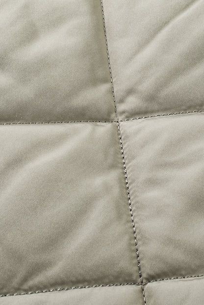 Grasgrüne, gesteppte, lange Weste mit Taschen