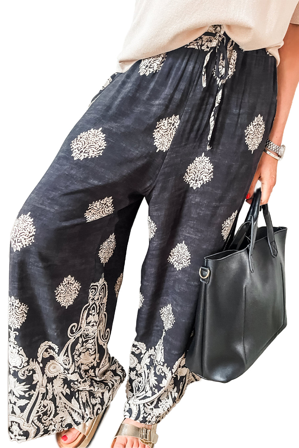 Schwarze Hose mit weitem Bein und Bohemien-Print
