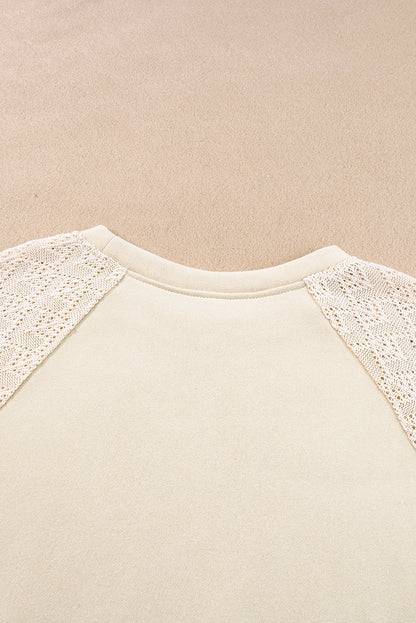 Pullover mit Raglanärmeln und Lochmuster im Patchwork-Stil aus Pergament