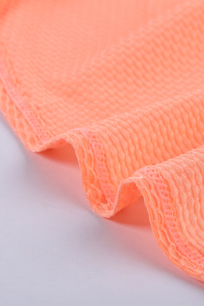 Orangefarbener bedruckter Racerback-Tankini mit Spleißmuster
