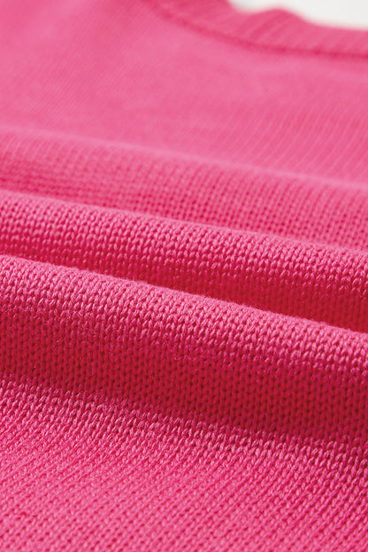 Rippstrickpullover mit überschnittener Schulterpartie und Rosenherz-XOXO-Muster