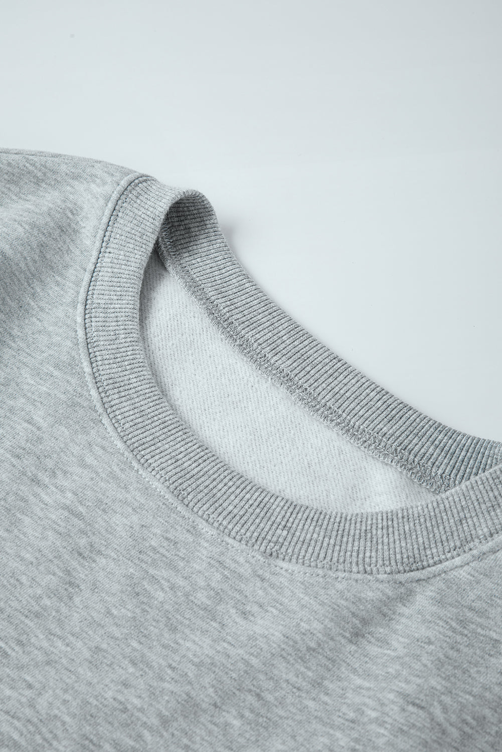 Hellgraues, einfarbiges, lockeres Fleece-Sweatshirt mit Rundhalsausschnitt