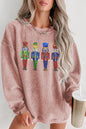 Rosafarbenes, weites Sweatshirt mit Pailletten und Nussknacker-Puppe