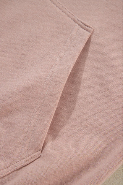 Fuchsiafarbener Kapuzenpullover mit Raglanärmeln und Nieten und Tasche