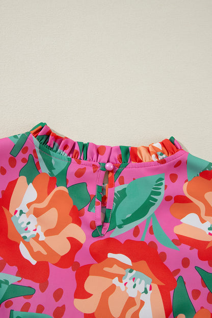 Bluse mit Rundhalsausschnitt und Rosen-Blumendruck und Rüschen