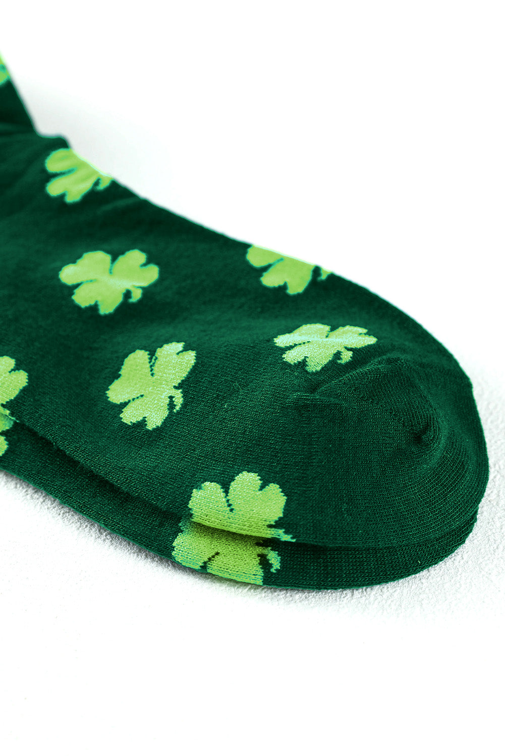 Dunkelgrüne Schlauchsocken mit St. Patricks Kleeblatt-Print