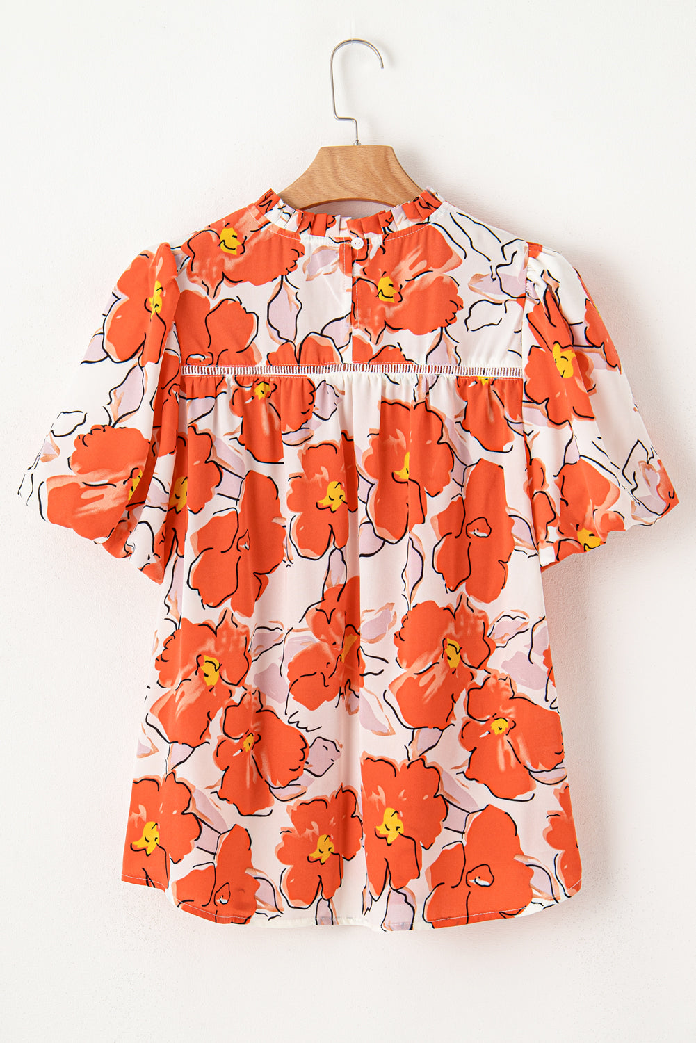 Orangefarbene Bluse mit Blumenmuster, Puffärmeln und Rüschenkragen