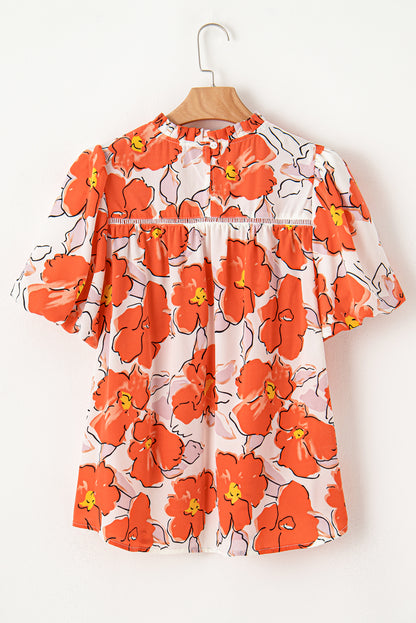 Orangefarbene Bluse mit Blumenmuster, Puffärmeln und Rüschenkragen