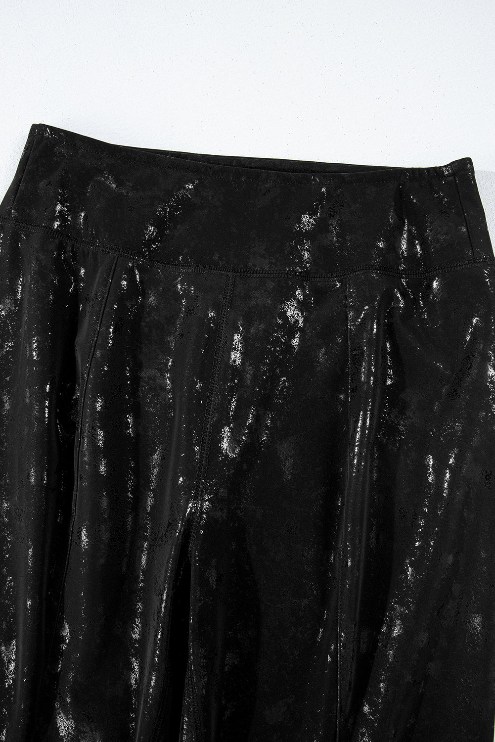 Schwarze Leggings mit Schlitzen und hoher Taille aus Kunstleder