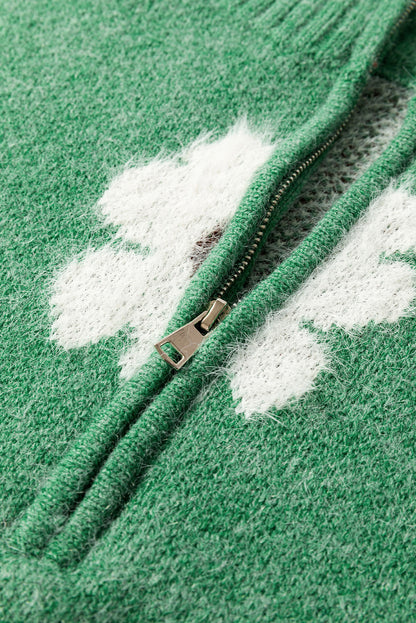Grüner Pullover mit Blumenmuster und halblangem Reißverschluss sowie überschnittenen Schultern