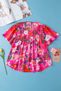 Rosa, gesmoktes, kurzärmliges Blusenkleid mit Blumenmuster
