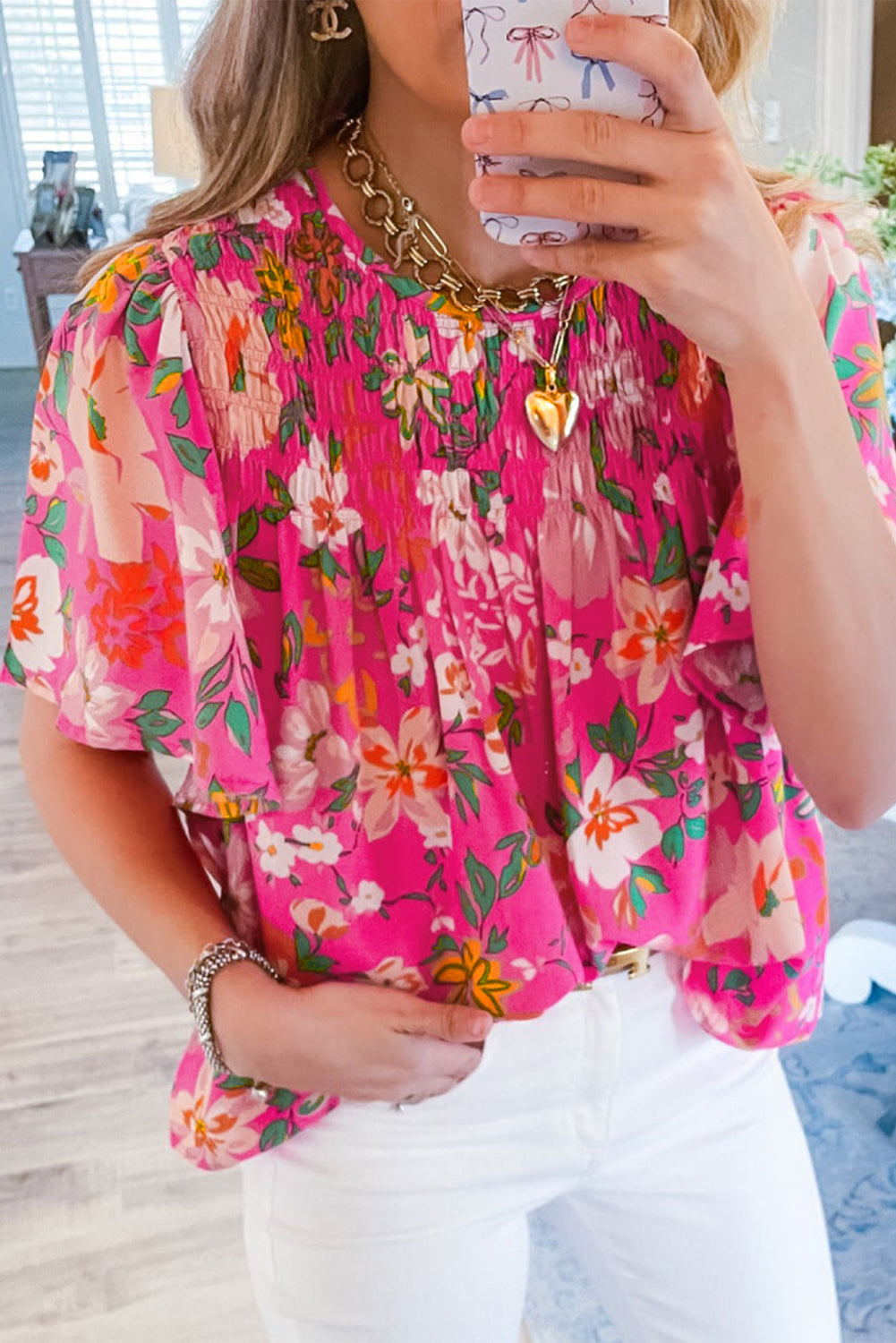 Rosa, gesmoktes, kurzärmliges Blusenkleid mit Blumenmuster