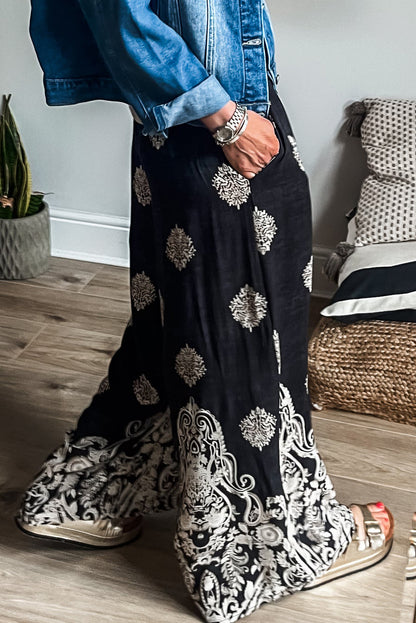 Schwarze Hose mit weitem Bein und Bohemien-Print