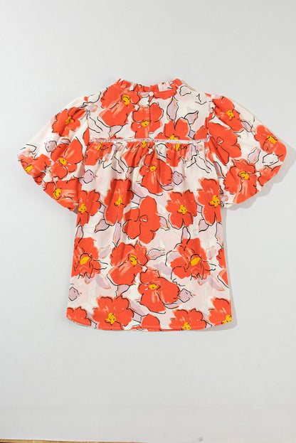 Orangefarbene Bluse mit Blumenmuster, Puffärmeln und Rüschenkragen