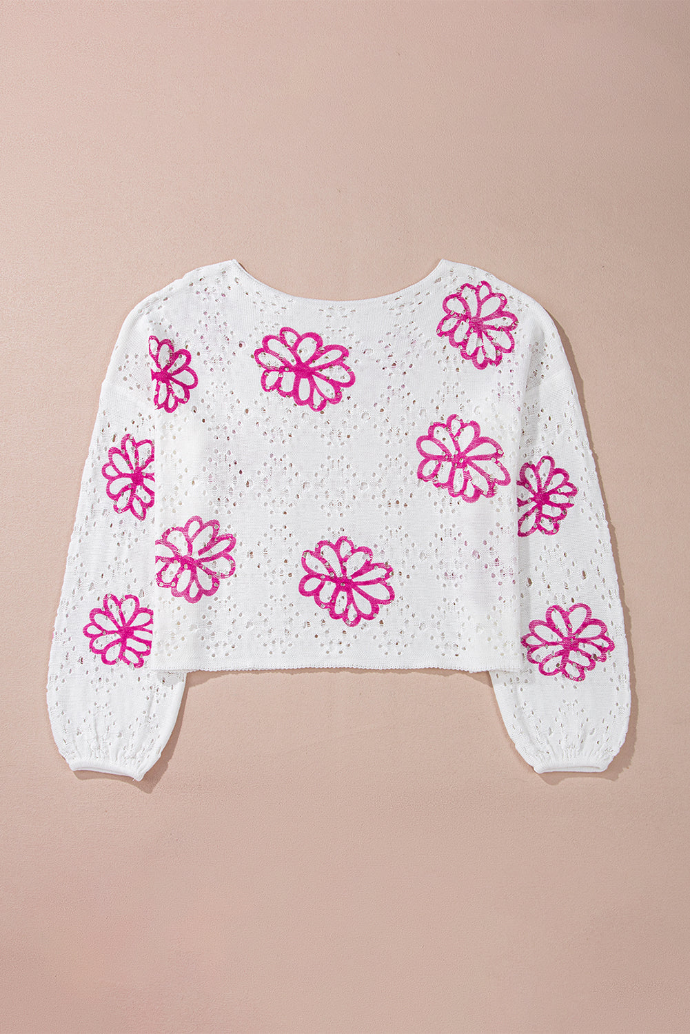 Weißer Pullover mit kontrastierendem Blumenmuster und überschnittener Schulter
