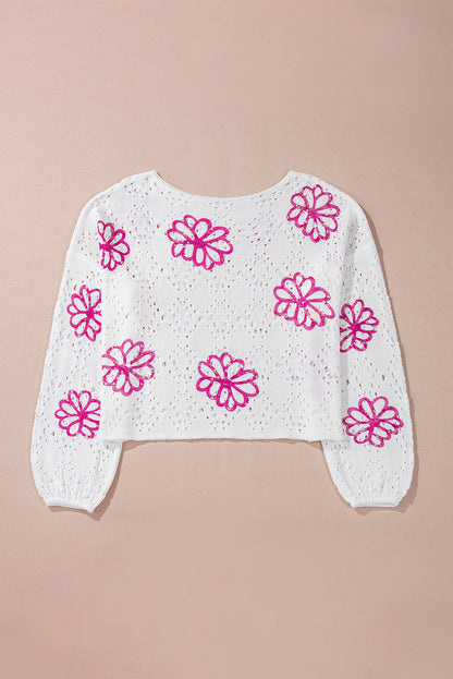 Weißer Pullover mit kontrastierendem Blumenmuster und überschnittener Schulter