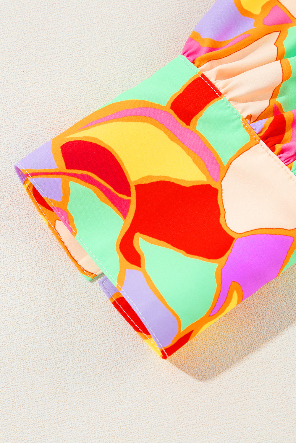 Gelbe Bluse mit Puffärmeln und abstraktem Print