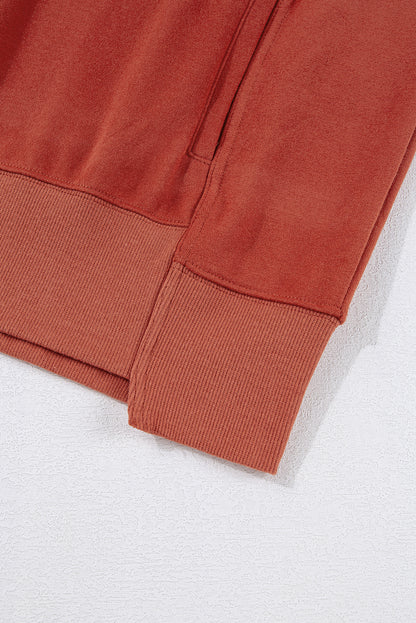 Red Clay – Weite Kapuzenjacke mit überschnittener Schulterpartie und Taschen