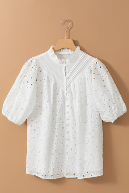 Weiße Bluse mit Blumenstickerei und Puffärmeln