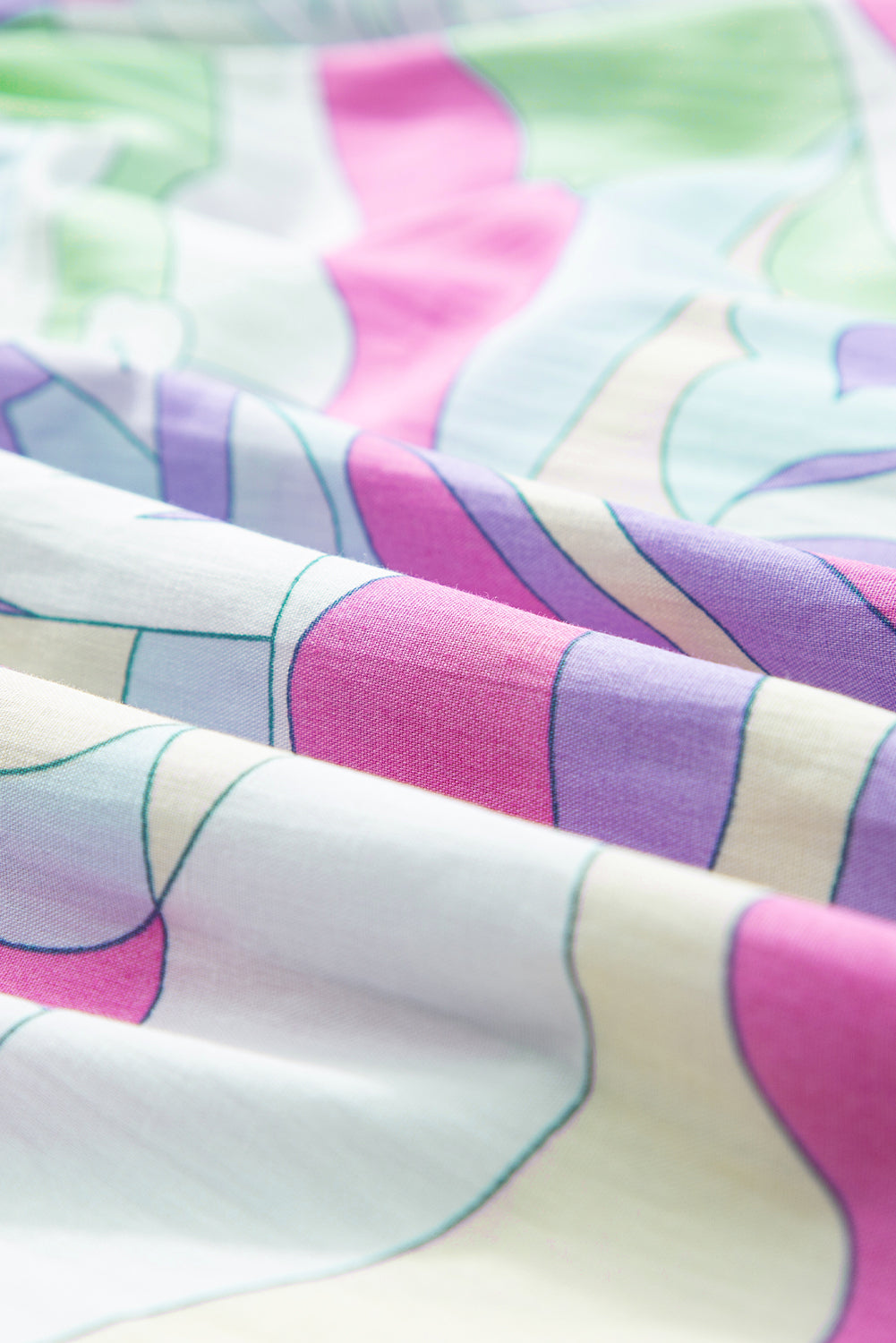Grüne Bluse mit abstraktem Print und Puffärmeln