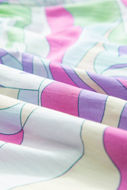 Grüne Bluse mit abstraktem Print und Puffärmeln