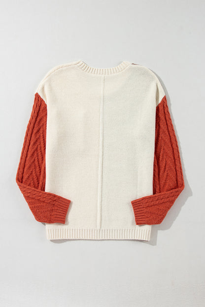 Pullover mit überschnittener Schulter und aufgesetzter Tasche in Colorblock-Optik in Gold Flame