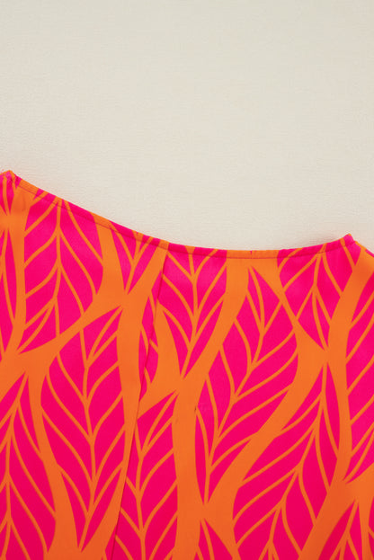 Rose – Bluse mit gesmokten Puffärmeln und tropischem Blattmuster