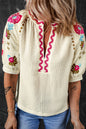 Beigefarbene Bluse mit floraler Stickerei und strukturierten Puffärmeln im Ricrac-Stil