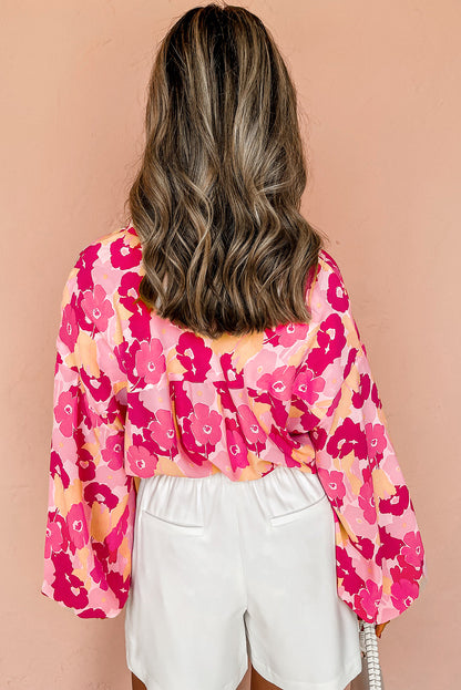 Rosafarbenes Hemd mit Puffärmeln und Blumenmuster