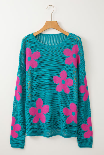 Seegrüner Strickpullover mit großer Blume und tief angesetzten Schultern
