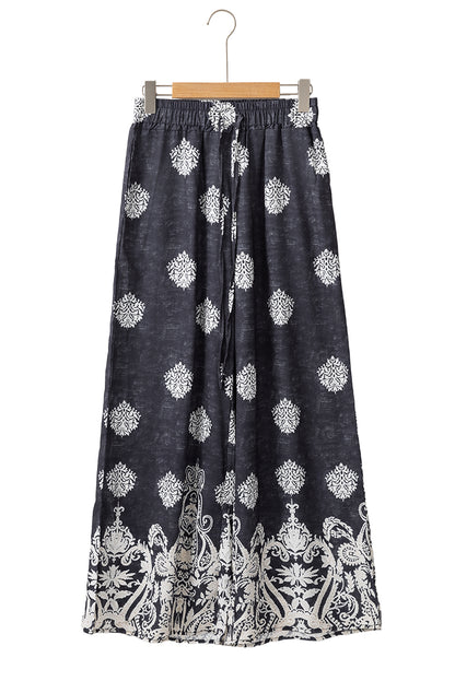Schwarze Hose mit weitem Bein und Bohemien-Print