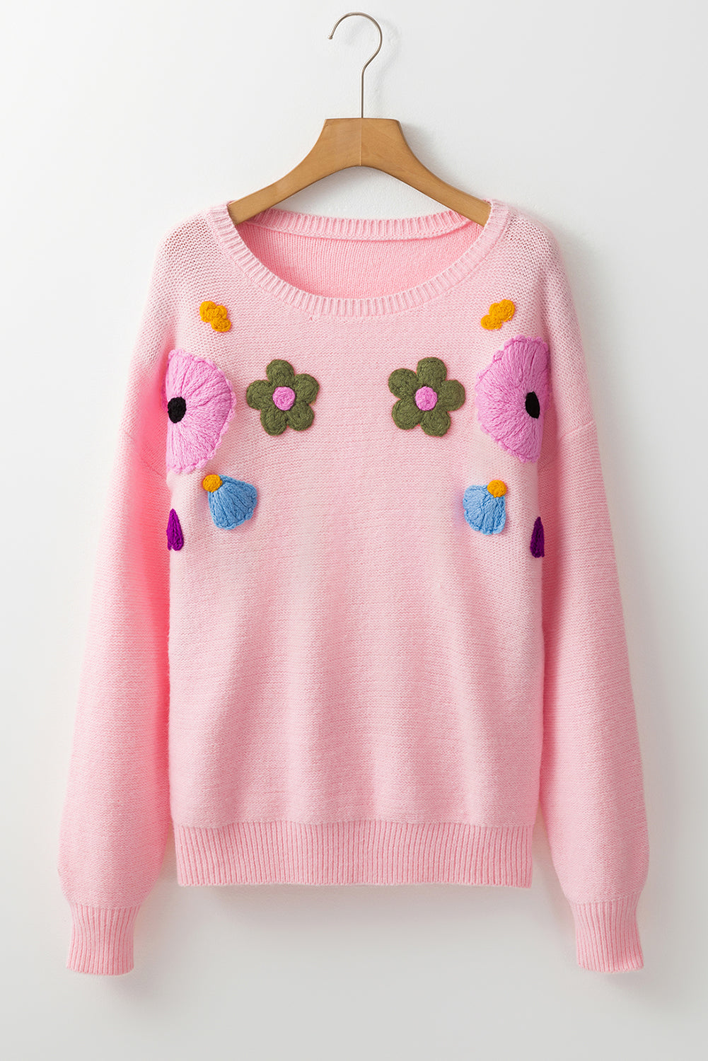 Rosa Strickpullover mit Blumenmuster und geripptem Rand