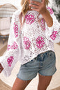 Weißer Pullover mit kontrastierendem Blumenmuster und überschnittener Schulter