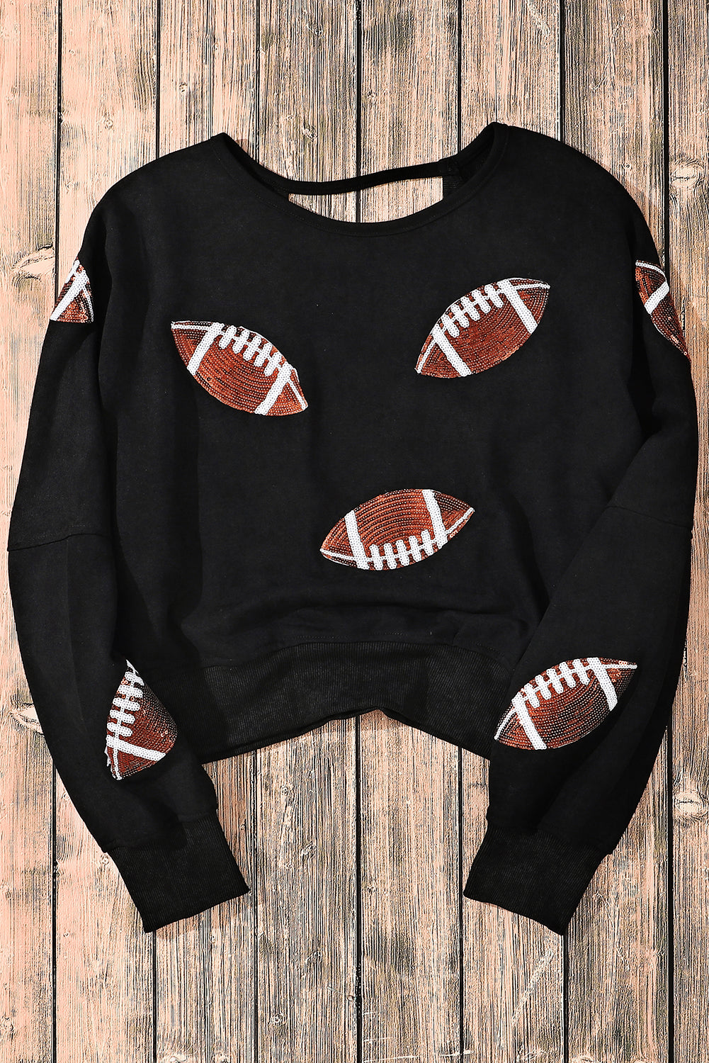 Schwarzes Sweatshirt mit offener Rückseite und Rugby-Grafik und Pailletten
